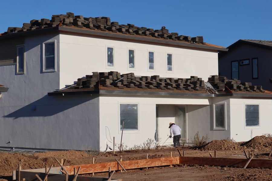Roofer working on a new house roof